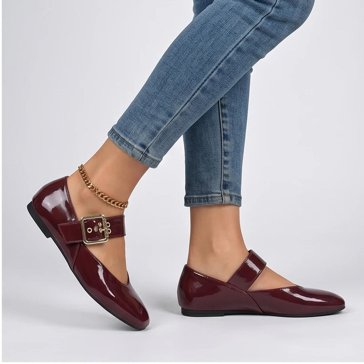 Model wearing Red Larkin Buckle Mary Jane Flats in studio