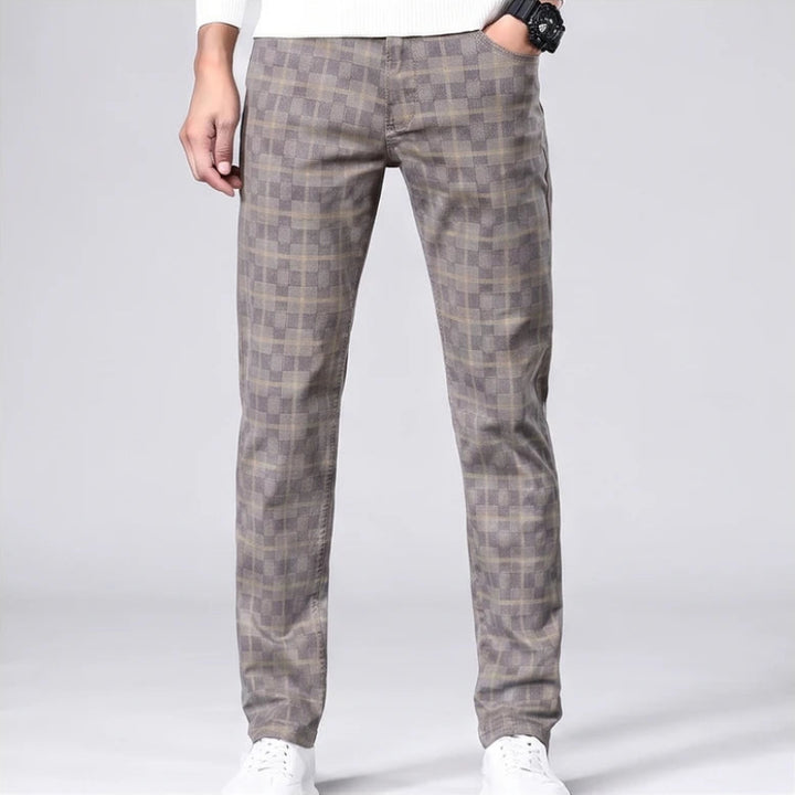 Model wearing Light Khaki cotton pants in a studio