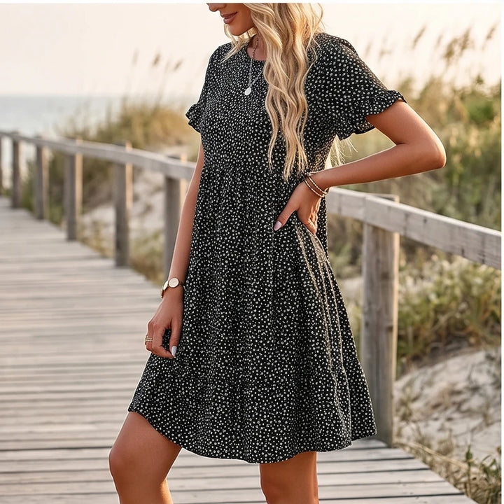 Model wearing Black Dotted Mini A-Line Sundress with Short Sleeves outdoors - 2