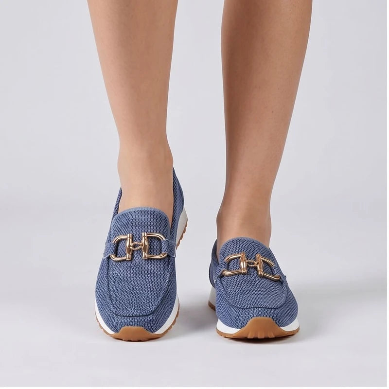 Model wearing Blue knit loafer in a studio
