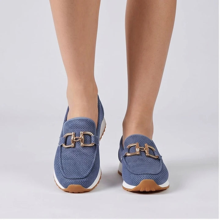 Model wearing Blue knit loafer in a studio
