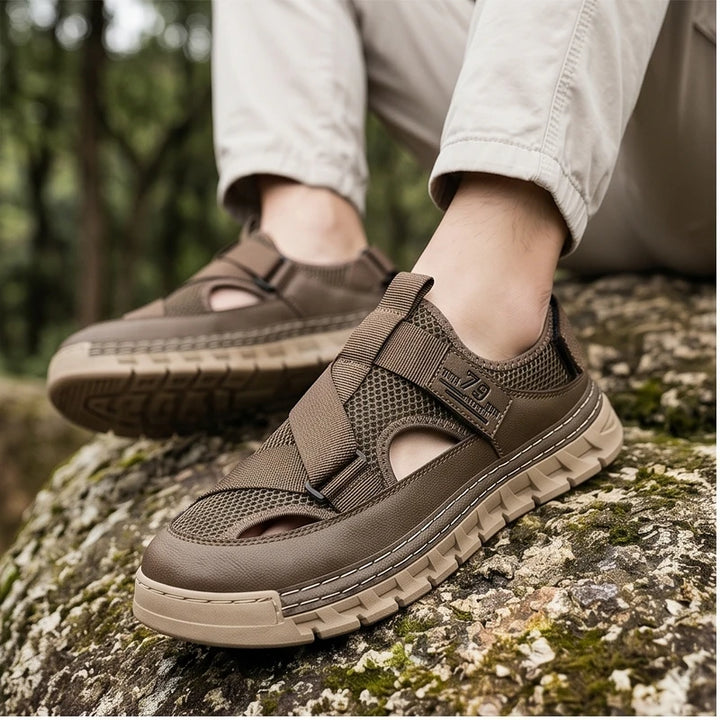 Model wearing Brown Ridgeway Mesh Sport Sandals outdoors