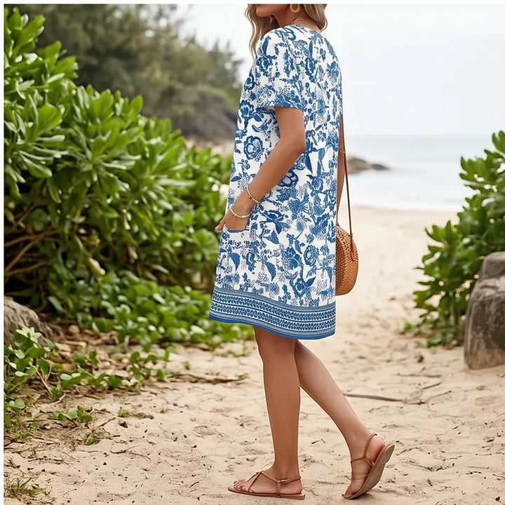 Model wearing C Women's Dress New Summer Casual V-Neck Wedding Loose Dress Short Sleeve Fashion Beach Vacation Wear dress outdoors - 3