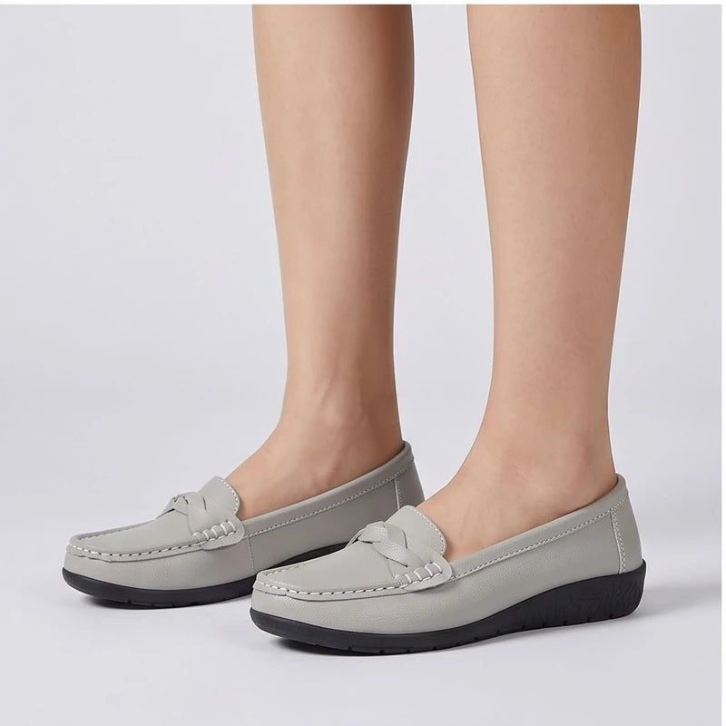 Model wearing Gray leather flats in a studio - 3