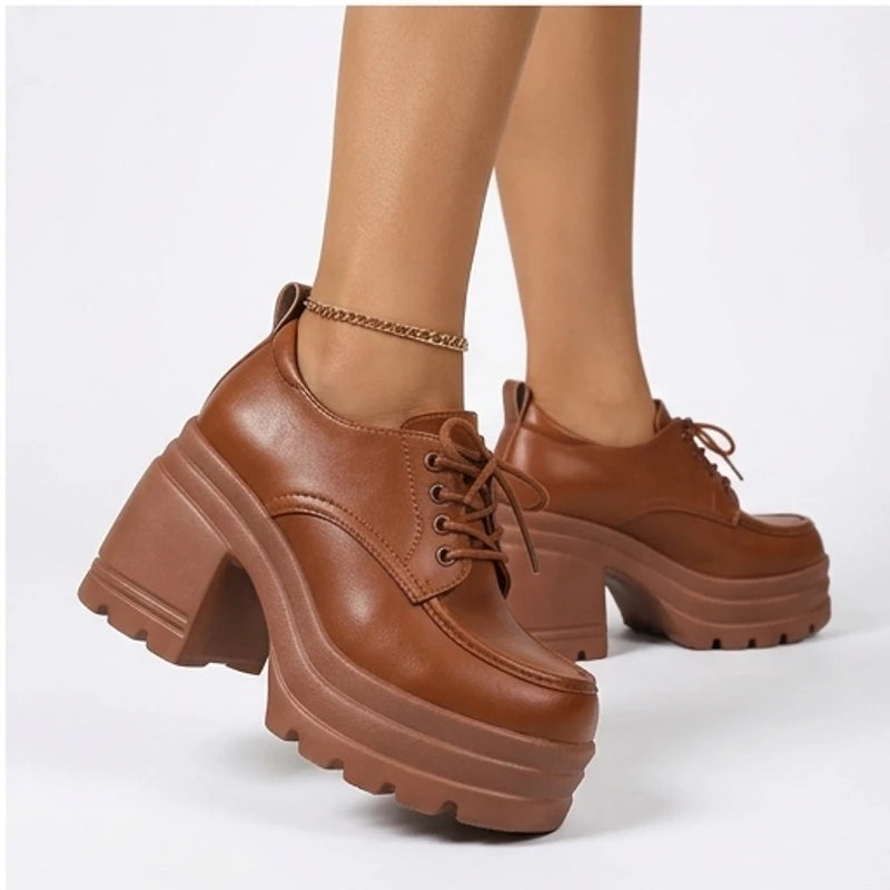 Model wearing Brown Veya Chunky Platform Leather Boots in studio - 4
