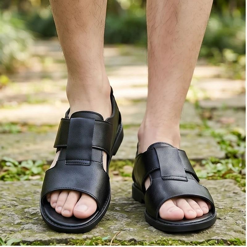 Model wearing black Kestrel Genuine Leather Gladiator Sandals outdoors