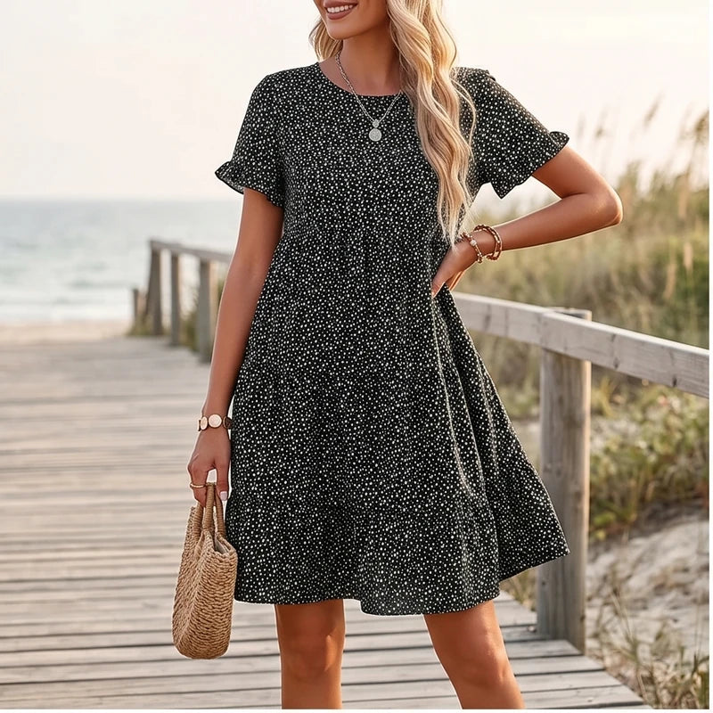 Model wearing Black Dotted Mini A-Line Sundress with Short Sleeves outdoors