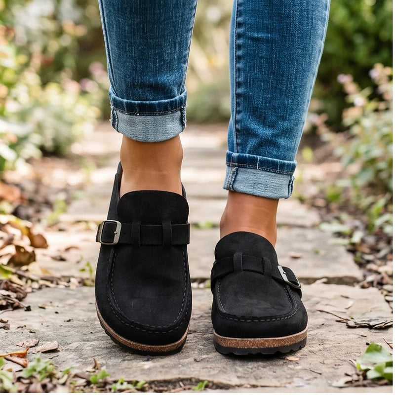 Model wearing Black 2026 New Women's Shoes Slip on Female Flats Durable Belt Buckles Mules Fashion Wear Resistant Women Half Slippers Retro Zapatos outdoors