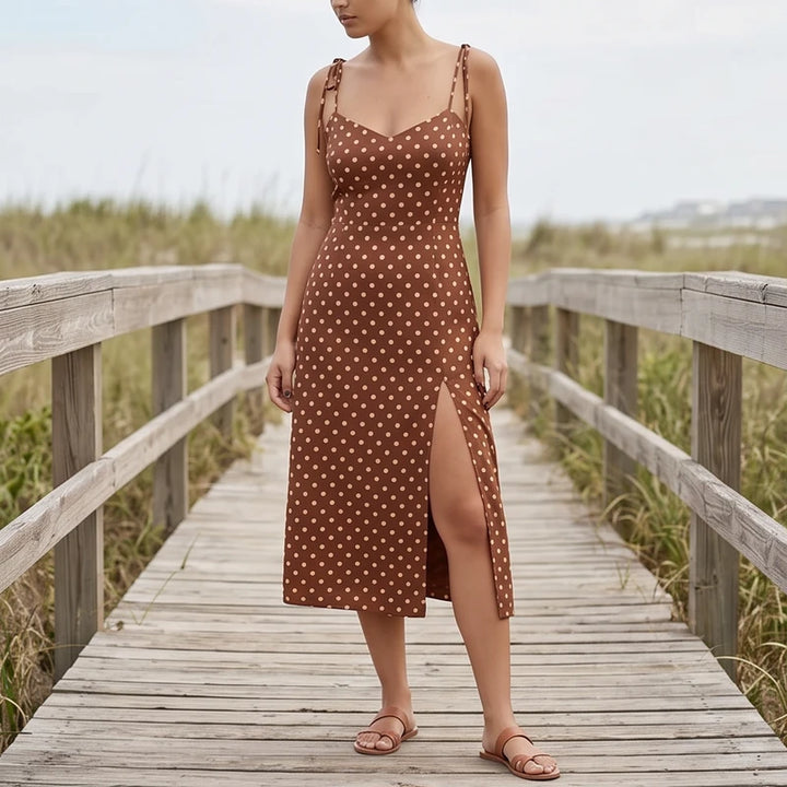 Model wearing Brown Cortez Polka Dot Midi Dress outdoors