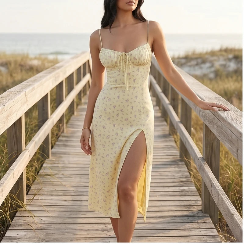 Model wearing Light Yellow Seraphine Floral Midi Slip Dress outdoors