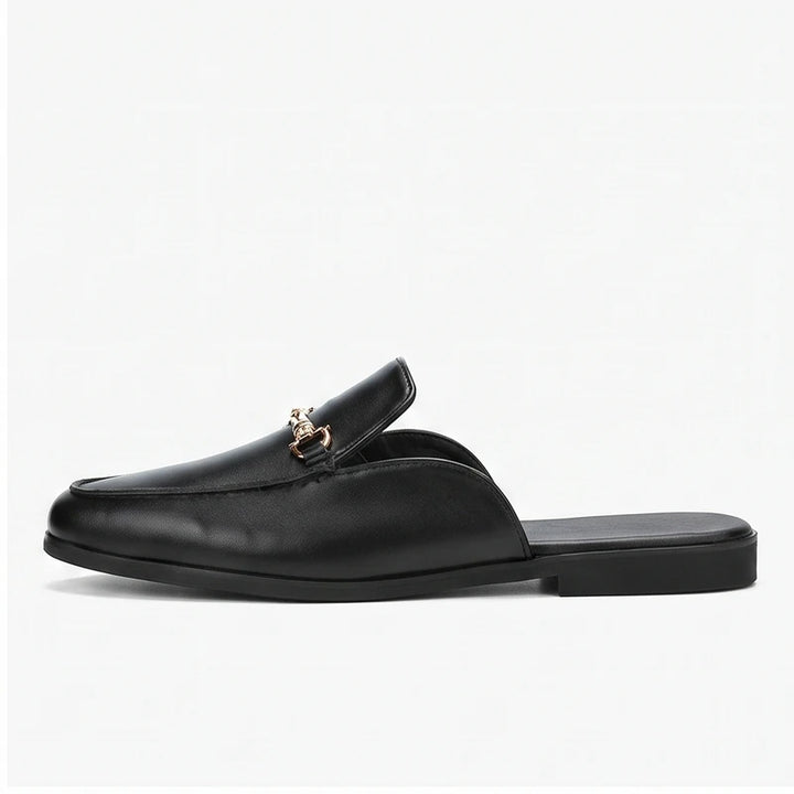 Black leather loafers on a white background - 2