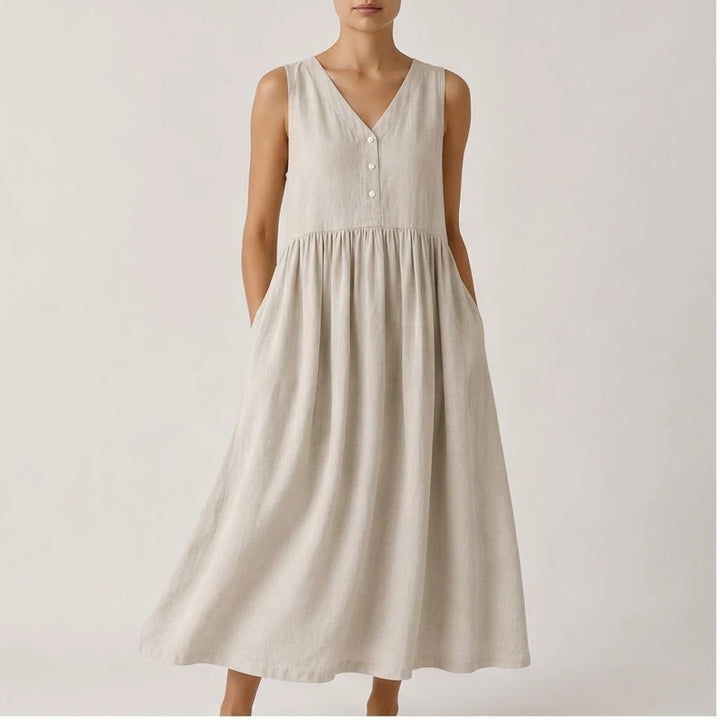 Model wearing Beige Mira Sleeveless Linen Dress in studio