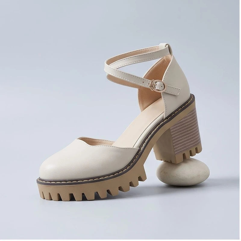 Ivory heels in a studio background