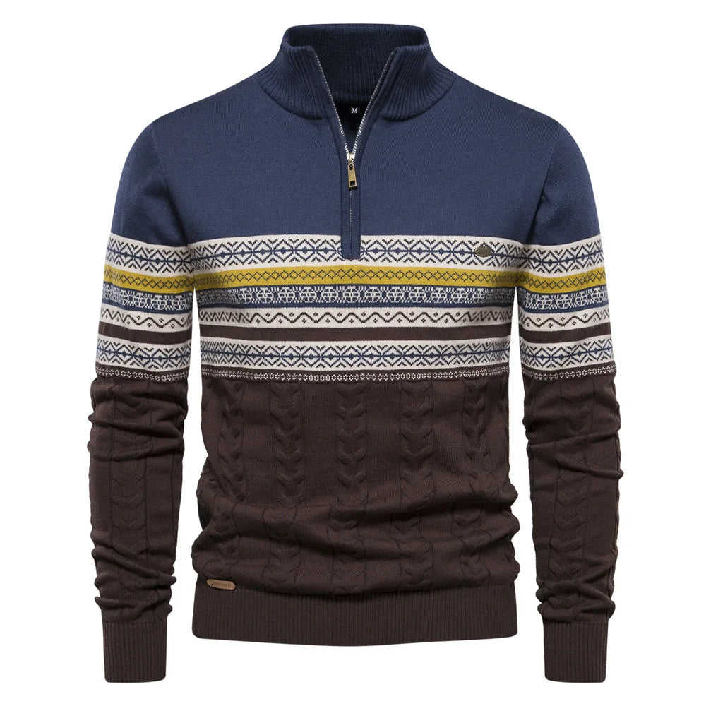 Blue and brown sweater with patterned sleeves on a white background