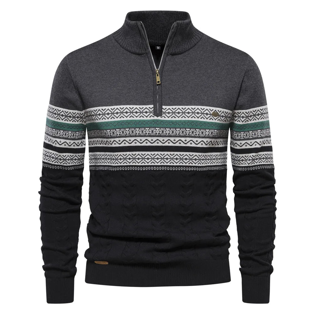 Black sweater with patterned sleeves on a white background