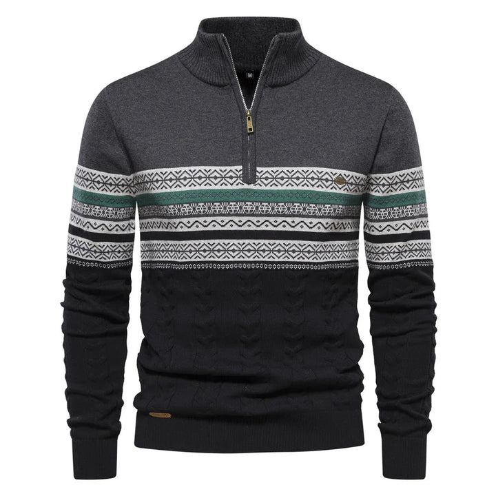 Black sweater with patterned sleeves on a white background