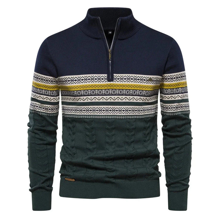 Navy sweater with patterned sleeves on a white background