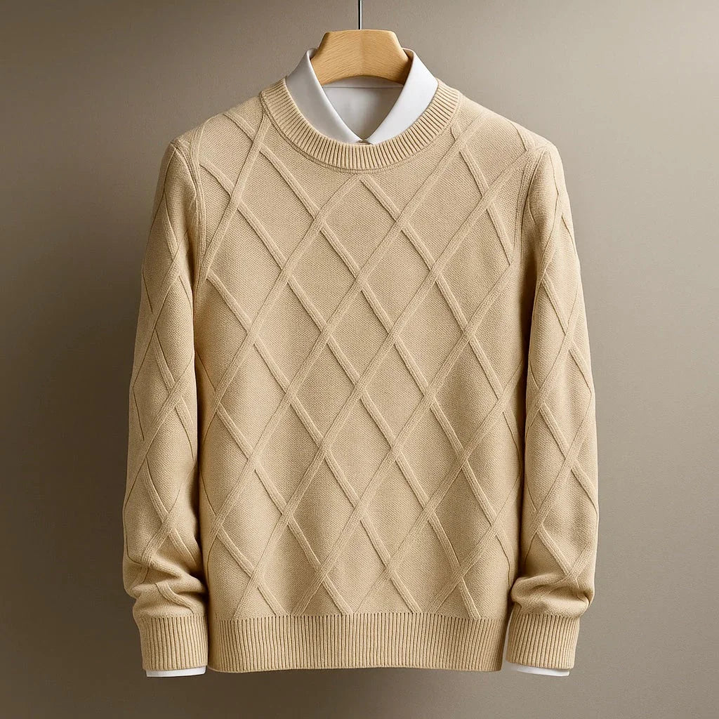 Beige sweater with diamond pattern on a hanger against a brown background