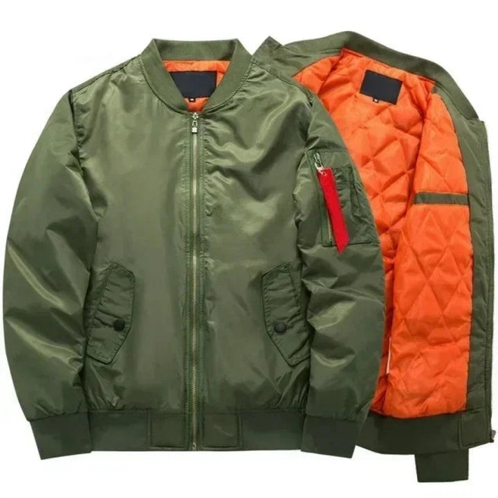 Olive green satin bomber jacket with ribbed collar, cuffs, and hem, revealing a bright orange quilted lining.