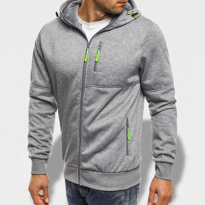 Gray fleece hoodie on an off-gray studio background
