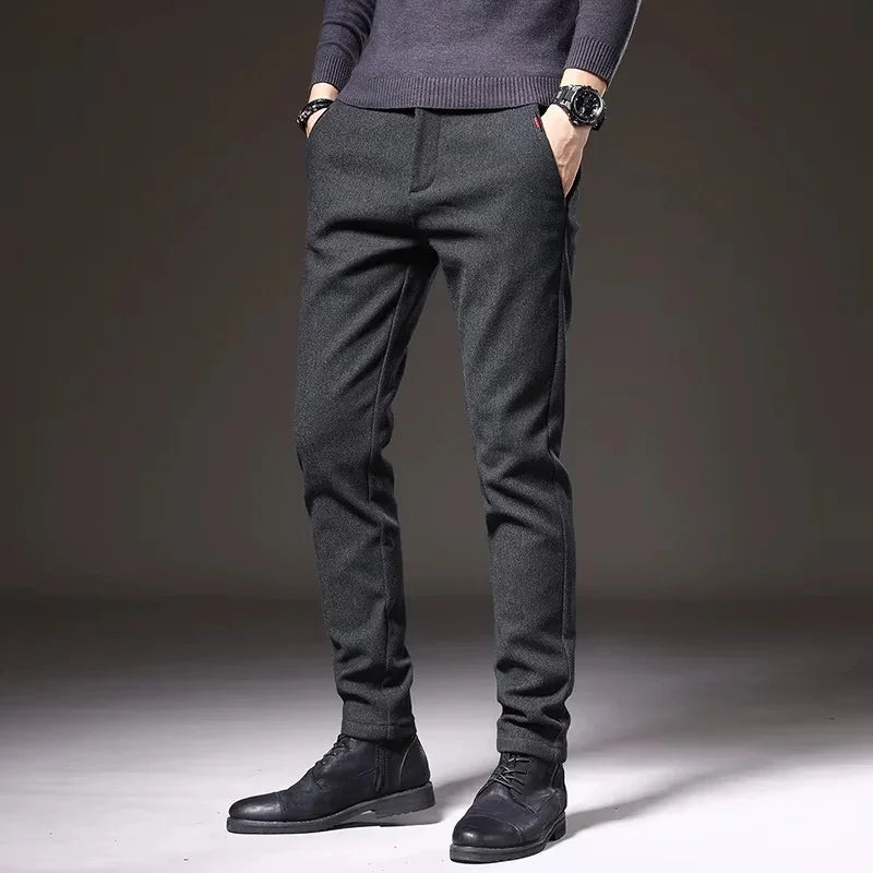 Henderson Slim-Fit Pants in dark color, showcasing a tailored fit with pockets and sleek style, perfect for modern occasions.