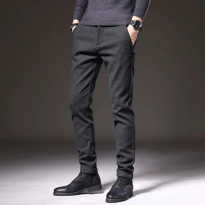 Henderson Slim-Fit Pants in dark color, showcasing a tailored fit with pockets and sleek style, perfect for modern occasions.
