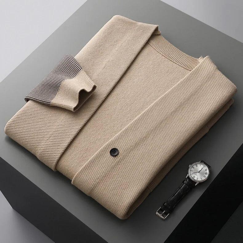 Rowan Merino Cardigan in beige, featuring ribbed contrast sleeves and clean button-front design.