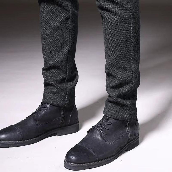 Henderson Slim-Fit Pants showcased with black boots, featuring a modern fit in a soft cotton-bamboo blend for comfort.