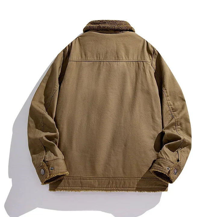 Back view of the Bastion Polar Fleece Jacket featuring a rugged outer shell and warm fleece lining.