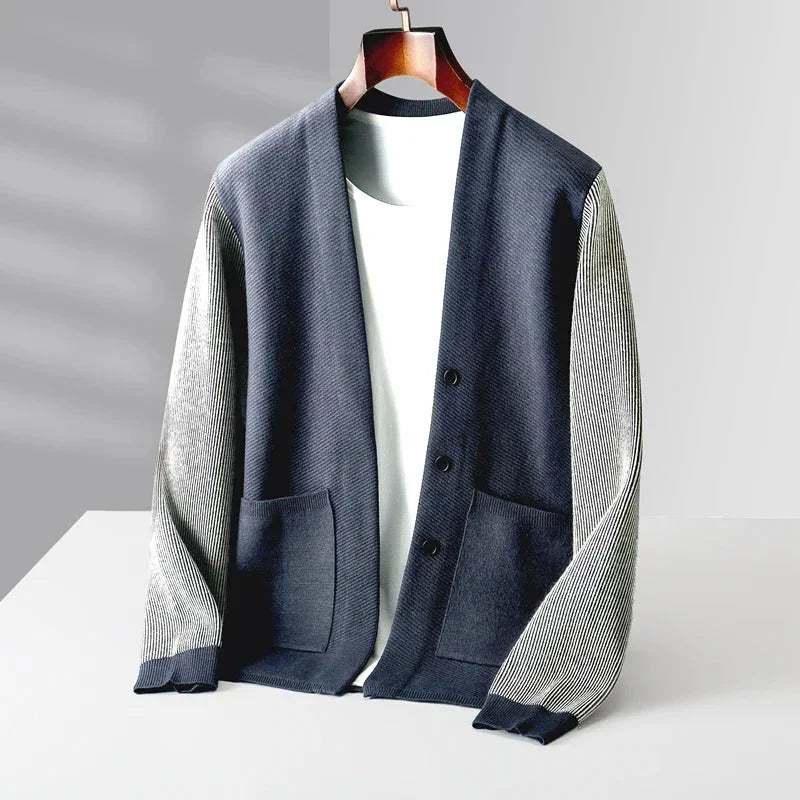 Rowan Merino Cardigan featuring soft merino wool, ribbed contrast sleeves, and a clean button-front design