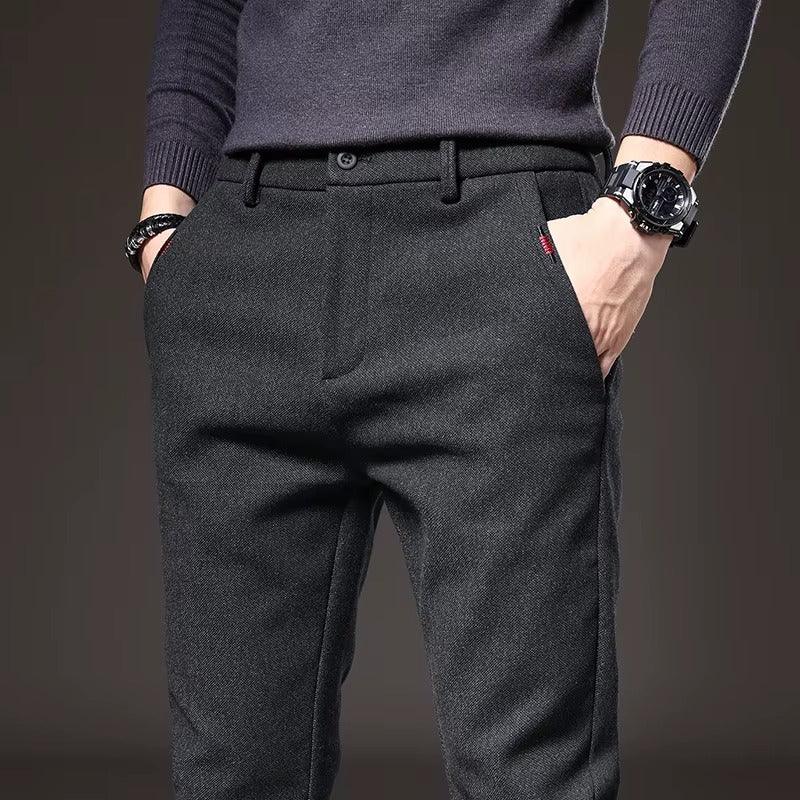 Close-up of Henderson Slim-Fit Pants in dark fabric, showcasing a tailored fit and stylish design, ideal for versatile occasions.