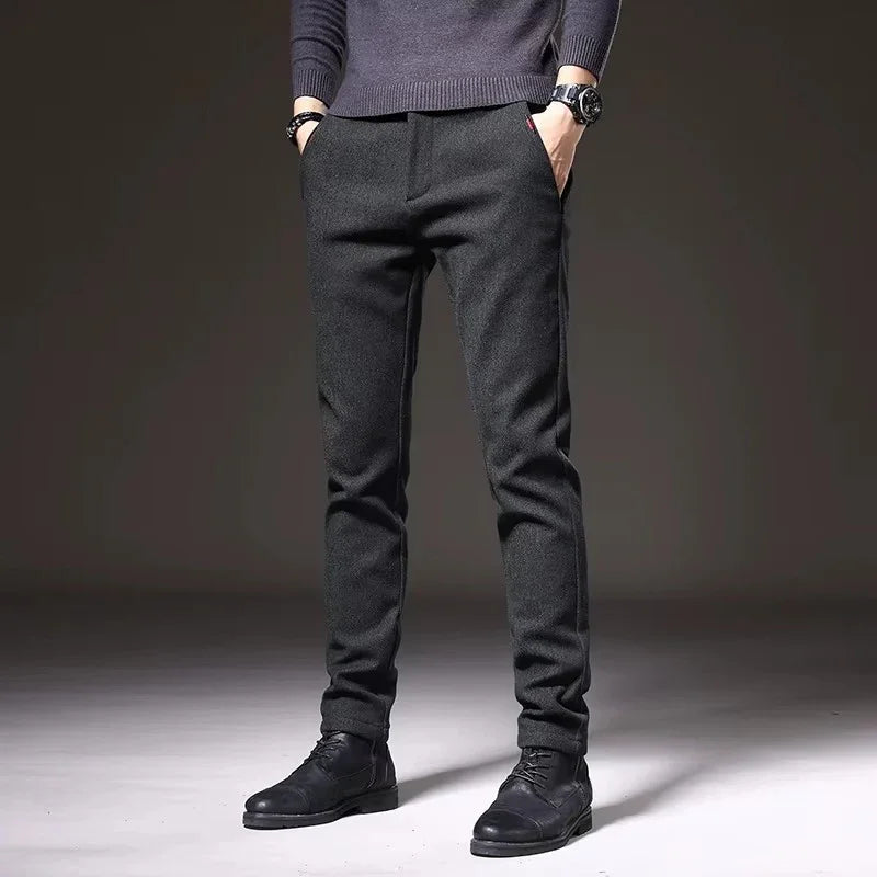 Henderson Slim-Fit Pants in dark color, showcasing a modern tailored design, perfect for casual and polished looks.