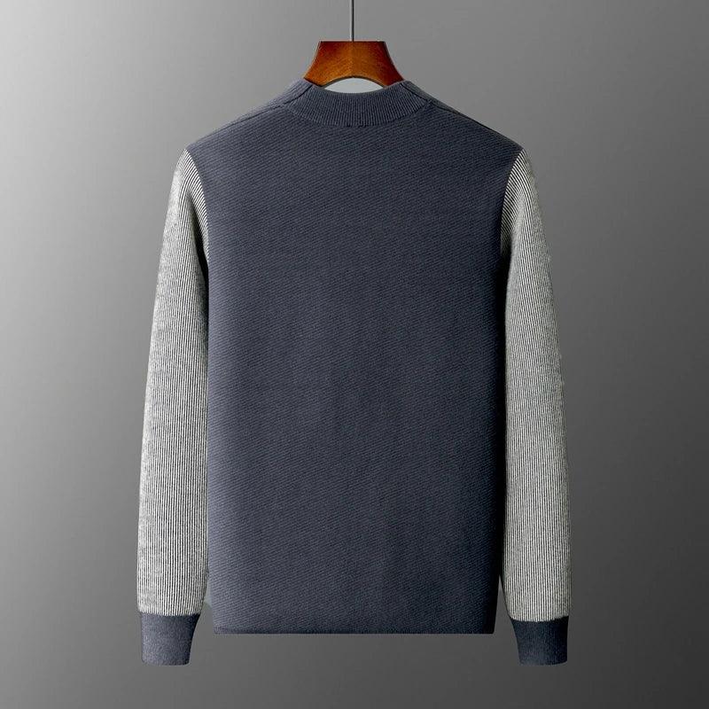 Back view of Rowan Merino Cardigan showcasing ribbed contrast sleeves and a clean silhouette.