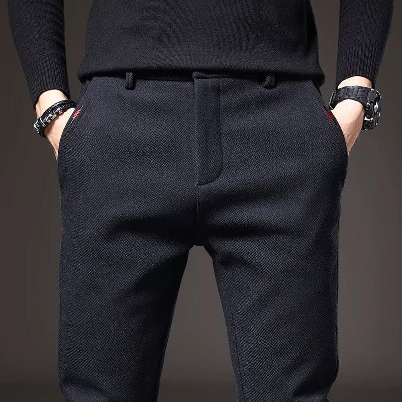 Henderson Slim-Fit Pants showcasing flexible, tailored fit in dark fabric, ideal for modern everyday wear.