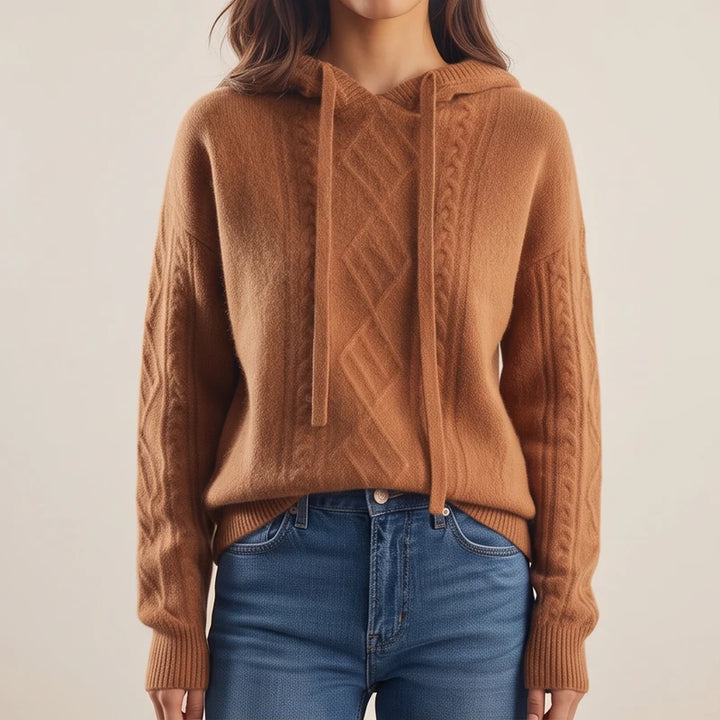 Model wearing Brown knit sweater in a studio