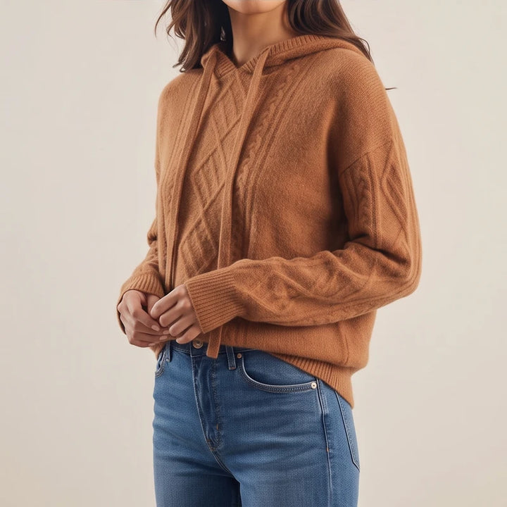 Woman model wearing Brown knit sweater in a studio