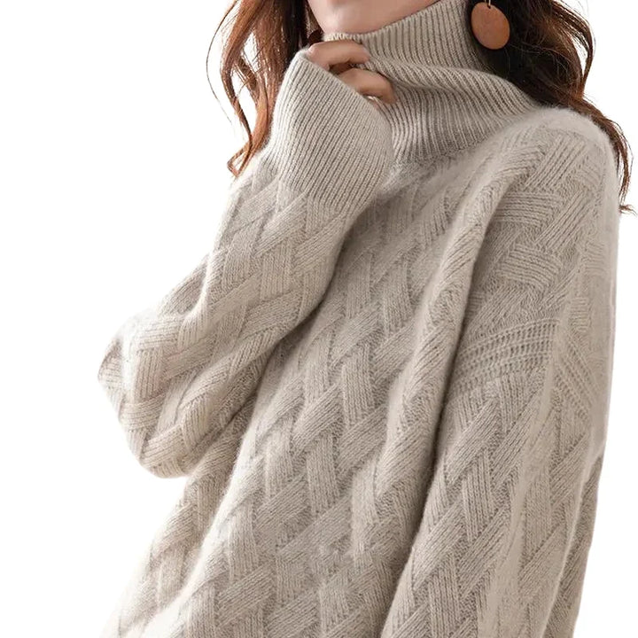 Beige turtleneck sweater worn by a person on a white background