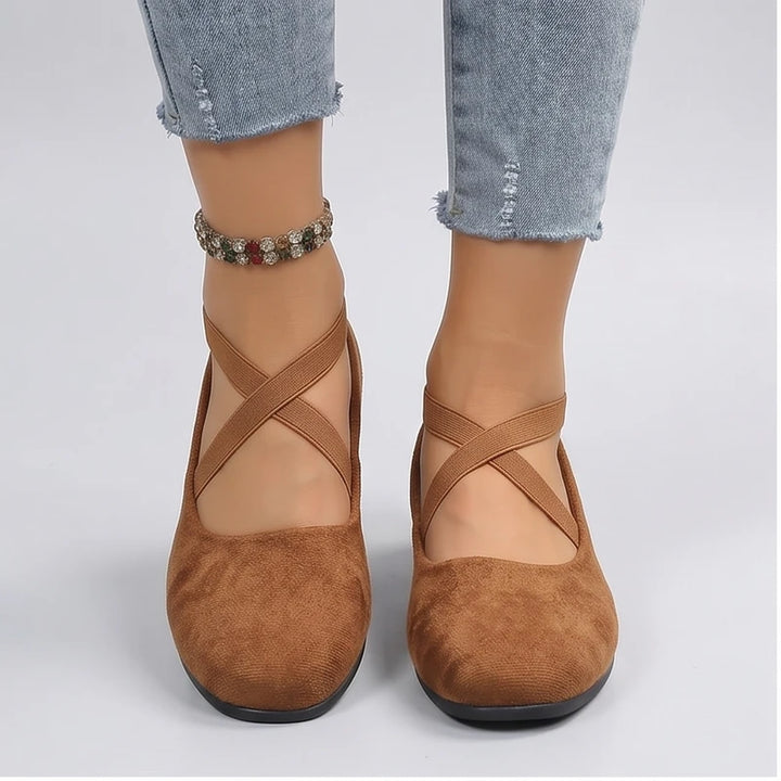 Model wearing Brown Selene Ballet Criss-Cross Flats in studio