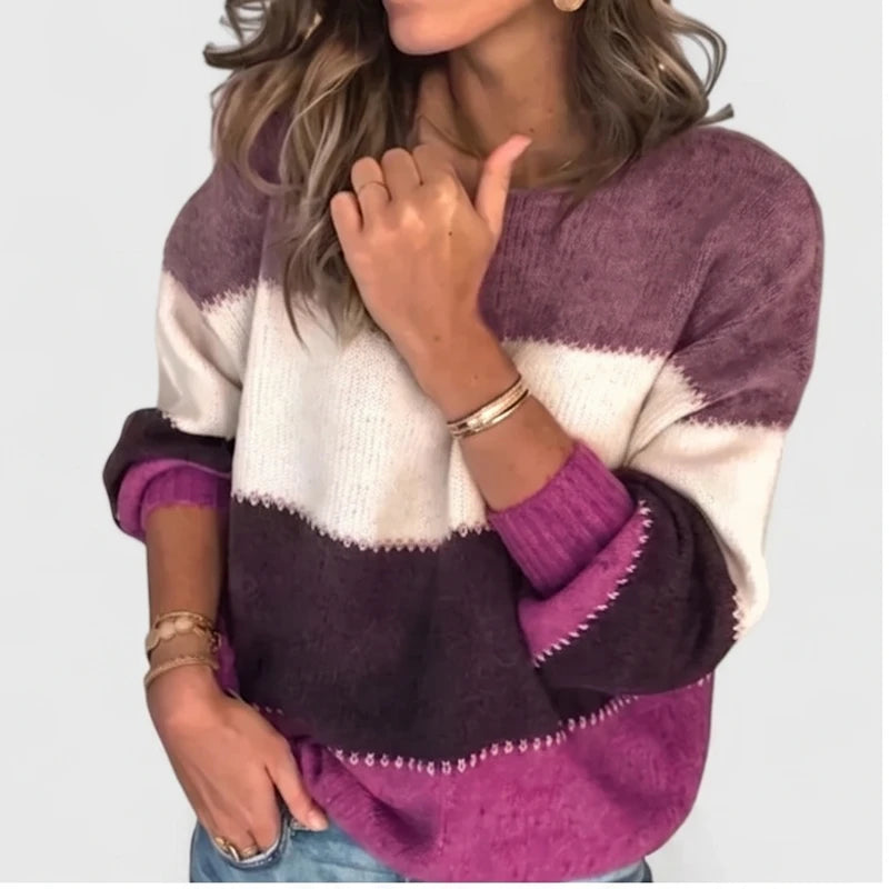 Model wearing Purple pullover in a studio