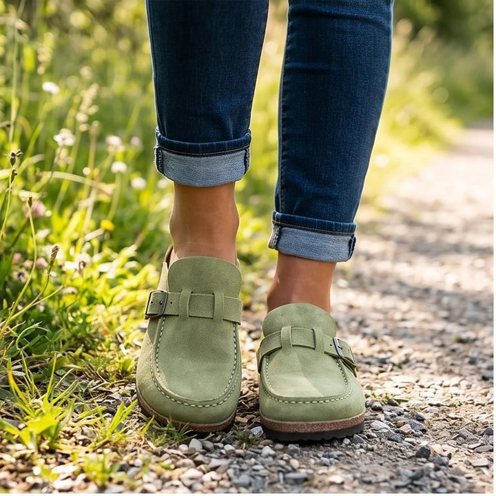 Model wearing Green 2026 New Women's Shoes Slip on Female Flats Durable Belt Buckles Mules Fashion Wear Resistant Women Half Slippers Retro Zapatos outdoors