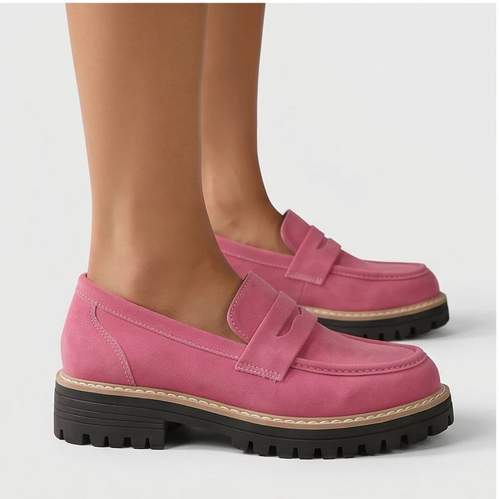 Model wearing Pink Brynn Suede Penny Loafers  [needs new images] in studio - 2