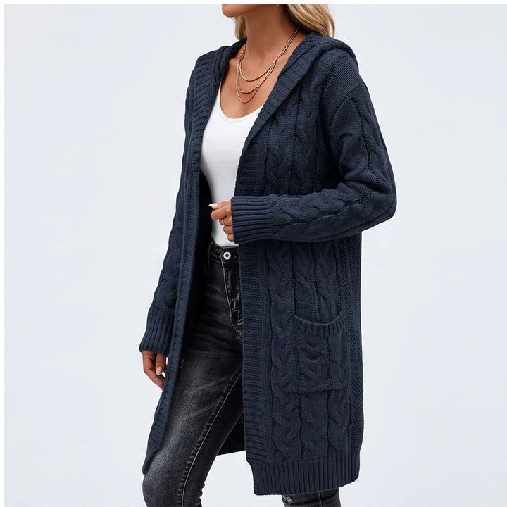 Model wearing E cardigan in a studio - 2