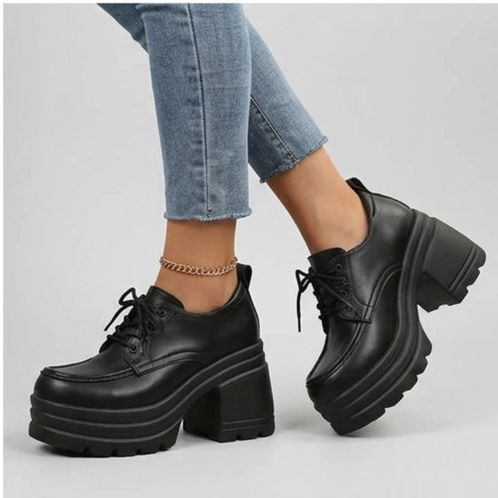 Model wearing Black Veya Chunky Platform Leather Boots in studio - 4