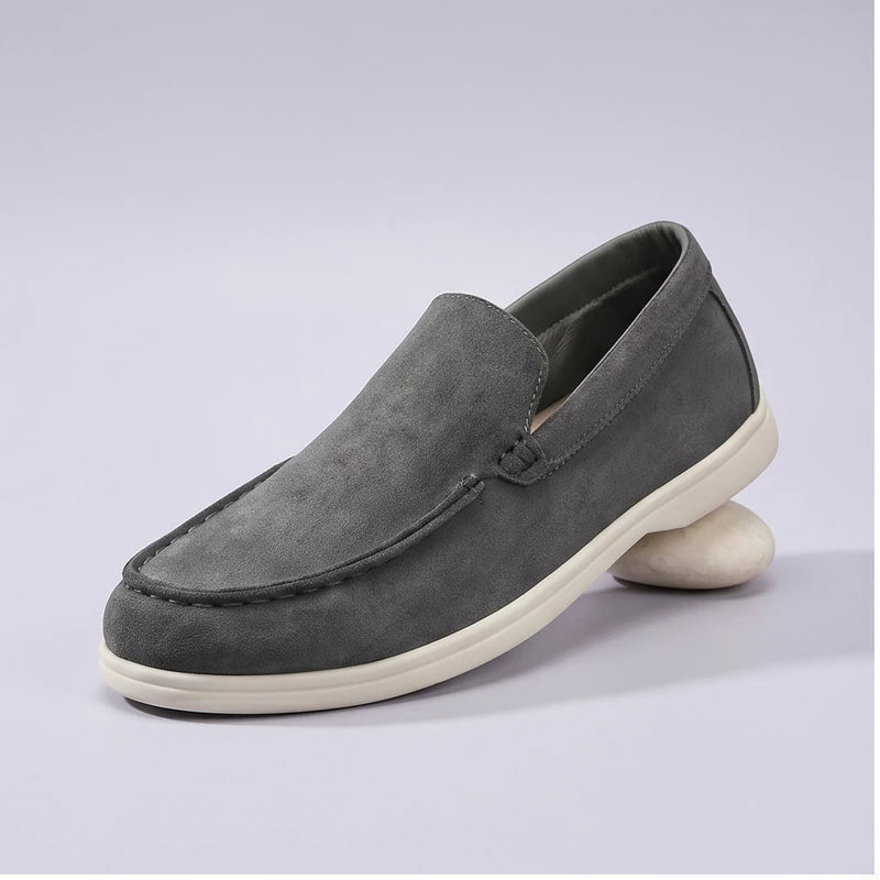 grey2 suede loafers in a studio background