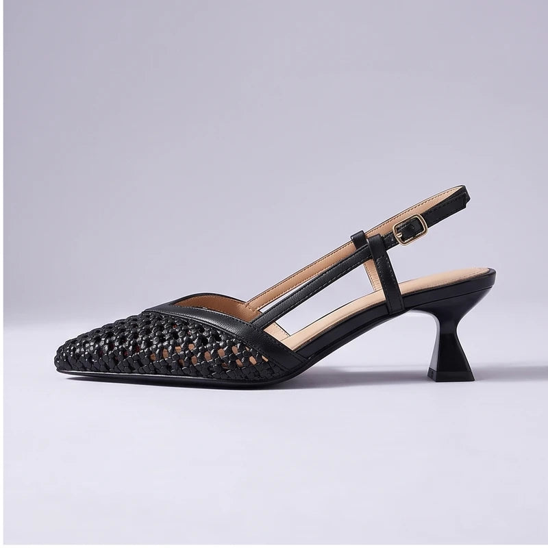 Black woven sandals in a studio background - 2