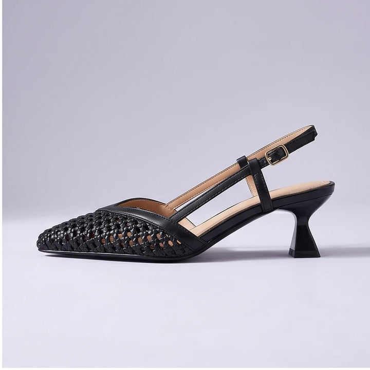 Black woven sandals in a studio background - 2