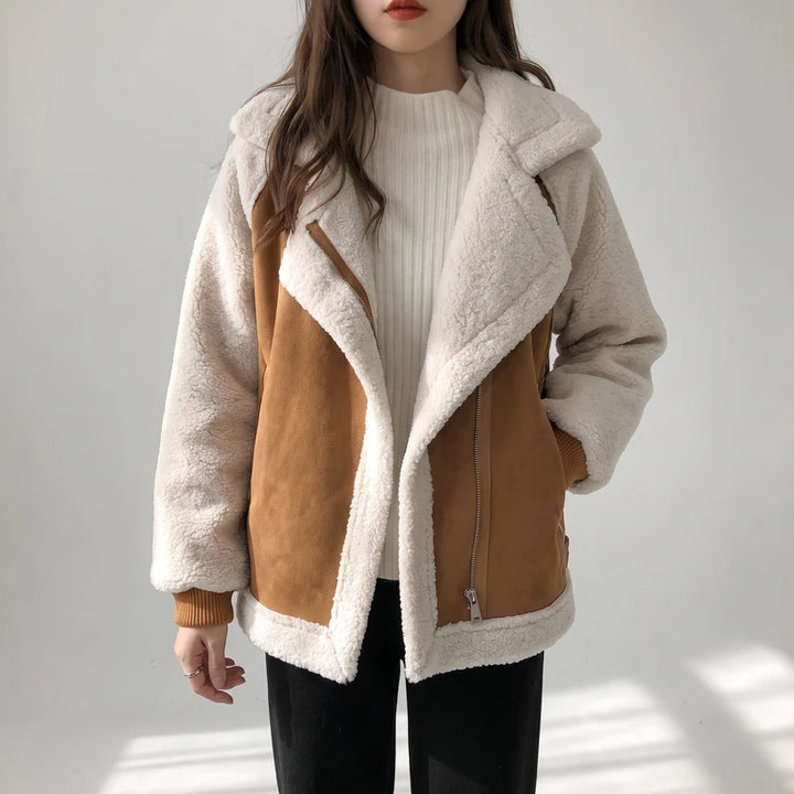 Khaki wool jackets on an off-gray studio background