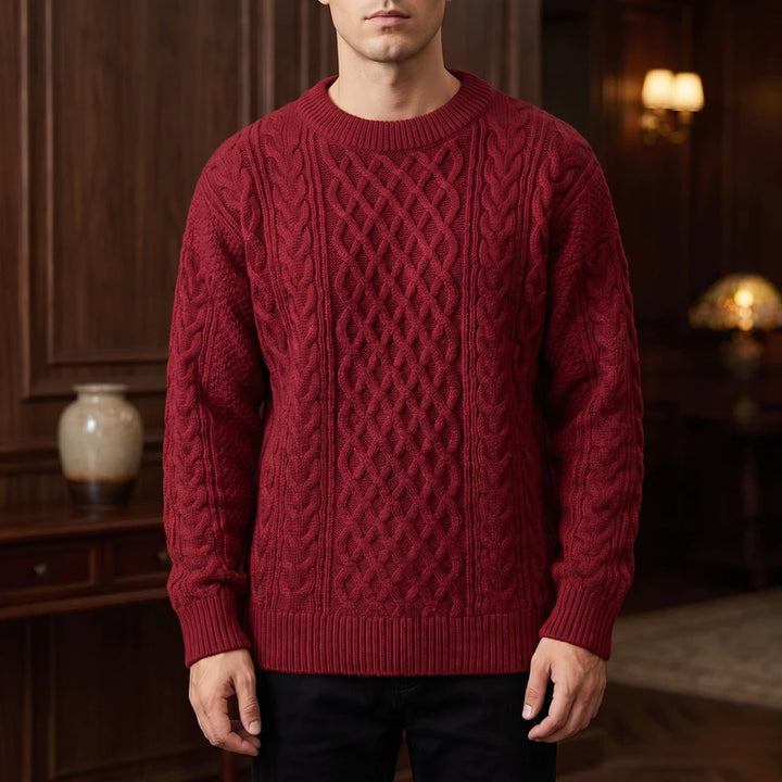 Burgundy knitted sweater in a dark wood interior