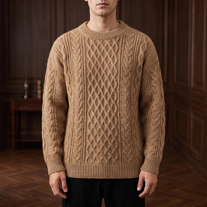 Khaki knitted sweater in a dark wood interior