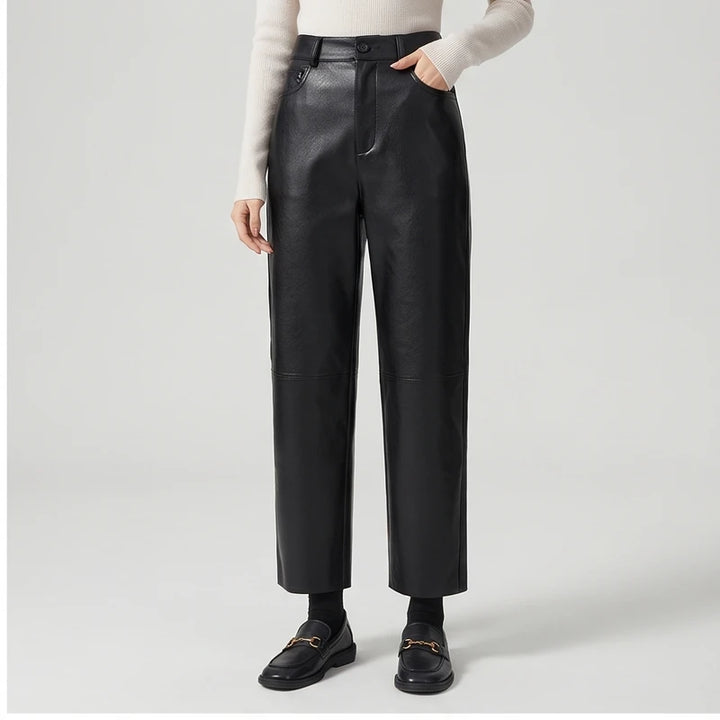 Black leather pants on an off-gray studio background - 2